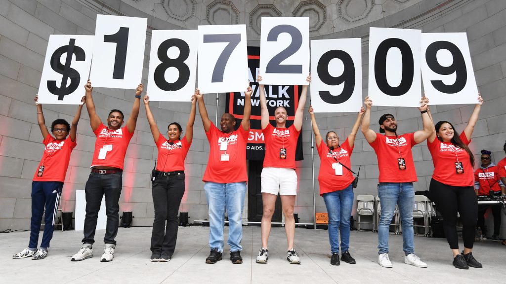 News 54 GMHC staff during the AIDS Walk 2024 fundraising total ceremony